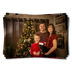 a stack of family christmas photos fort collins