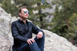 photo of high school senior in mountains