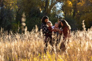 a photograph of a family at legacy park in fort collins