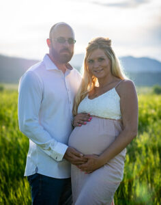 parents maternity photograph at sunset at spring canyon park fort collins colorado